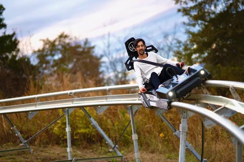 man riding on The Wild Stallion